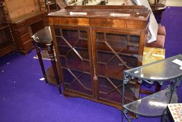 An early 20th Century mahogany display cabinet having astral glazed doors, width approx. 92cm