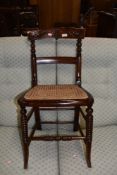 A Victorian stained frame cane seated bedroom chair