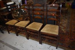 A set of vintage stained frame ladderback chairs