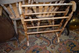 A traditional beech towel rail