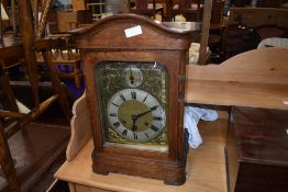 An oak cased mantel clock, movement named for Gustav Becker, height approx. 44cm