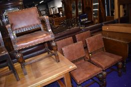 A set of five (four plus one) early 20th Century oak and studded leather dining chairs