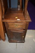 A reproduction oak pot cupboard, height approx. 70cm