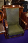 A 1930's stained frame recliner armchair