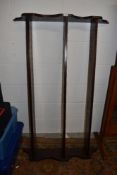 A traditional wall plate rack , in dark stain, width approx. 137cm