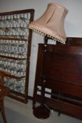 A traditional mahogany effect standard lamp