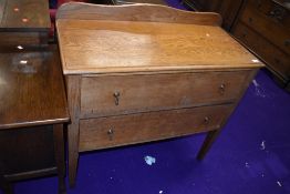 An early 20th Century golden oak bedroom chest of two drawers, width approx 95cm, nicely made with a