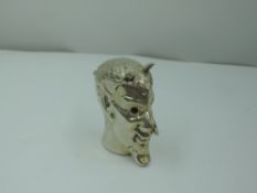 An HM silver novelty vesta modelled as a devil bearing horns to head, red glass eyes and press nose,