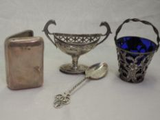 Four pieces of white metal and HM silver including a cigarette case of small form, boat shaped