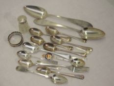A selection of HM silver and white metal spoons including souvenir, teaspoons and table spoons, a