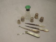 A small selection of HM silver and white metal including thimbles, small scent bottle having green