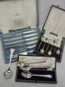 A selection of HM silver and white metal cased flatware including coffee spoons, butter knives,