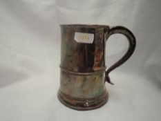 A Sheffield plate tankard with wooden base, thread detail to body and heart terminal to handle,