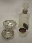 A small Edwardian silver candle holder of plain form having domed hinged lid, Birmingham 1908,