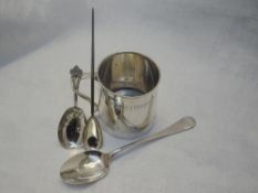 A small silver christening mug of plain form having striped decoration and monogram to front,