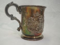 A Georgian silver Christening tankard bearing inscription dated 1891 and Repousse nursery scene with