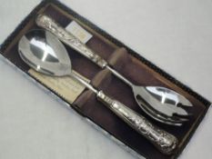 A cased set of salad servers having moulded silver handles in the Kings pattern, Sheffield 1973,