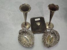 A pair of Edwardian silver trinket dishes of oval form having pierced decoration and scroll rims,