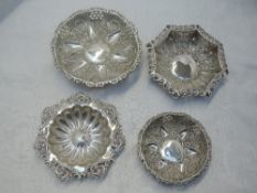 Four HM silver trinket dishes having moulded and pierced decoration, approx 151g