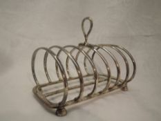 A large six slice toast rack of plain curved form, Sheffield 1922, Harrison Brothers & Howson,