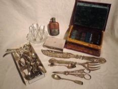 A selection of plated ware including a velvet case in form of a book containing set of twelve