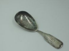 A Scottish silver caddy spoon having shaped oval bowl and monogram to terminal, Glasgow 1823,