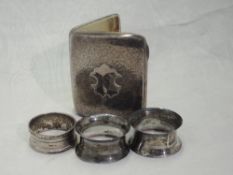 A Victorian silver cigarette case having foliate decoration and plain shield cartouche, Birmingham