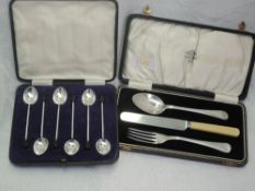 A cased set of six silver coffee spoons having coffee bean knops, Sheffield 1932, Walker & Hall, and