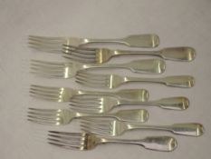 A selection of Victorian and Georgian silver table and dessert forks of fiddle back form, London