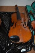 A traditional violin having two piece back, approx. 14inches, labelled 'metropole, made in