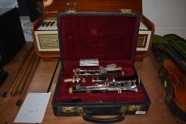 A Buffet Crampon clarinet in fitted case , model E13 (B), serial number K139960 with additional