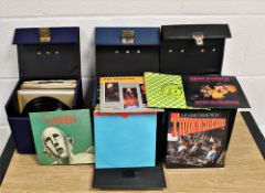 A lot of three boxes of seven inch singles - a real lucky dip here from rock and pop to 1960's and