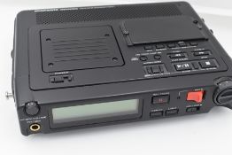 Two hard Peli 1600 cases of film sound equipment. In box one, a Marantz PMD671 professional Solid S