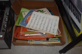 A box of mixed sheet music, mainly Hammond Organ pieces