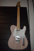 A Harley Benton telecaster style electric guitar, with padded Fender gig bag (please note currently