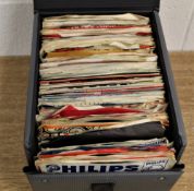 A carrying case of seven inch singles - a real random mix of styles and eras - case included -