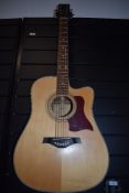 A Tanglewood TW15CE electro acoustic guitar, serial number 0305190146, and Thomann hard case