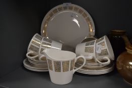 A part tea service by Queen Anne Ridgway having white and gold retro design