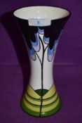 A modern ceramic vase in a Clarice Cliff style btamped Brian Wood L.Oakley Elmfield