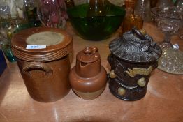 A late 19th century tobacco jar with lid, a small earthenware jug with hounds to lid and a jar.