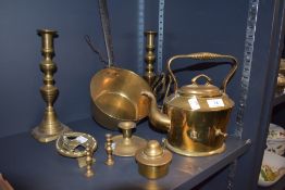A selection of fire side items including brass spirit kettle candle sticks and sauce pan