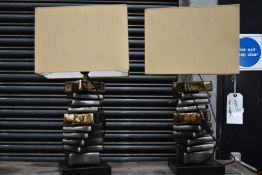 Two modernist styled twisted stem table lights