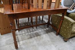 A Victorian stained frame side table on turned frame, approx. 117 x 53cm
