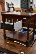 A traditional oak side table, being overstained, approx. 52 x 35cm