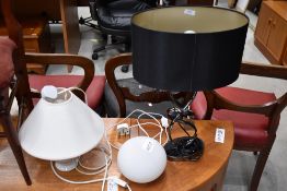 Three table lamps including metal bodied twist stem