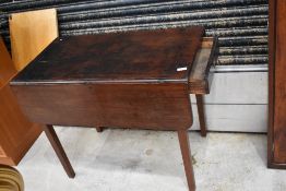 A 19th Century mahogany Pembroke style table, having frieze drawer and one dummy drawer, approx.