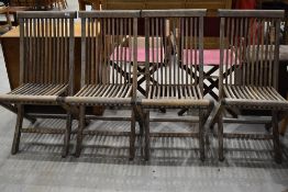 A set of four outside garden chairs in solid teak by Danish Scancraft design