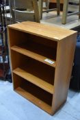 A 1970's teak book shelf approx 85cmx60cm