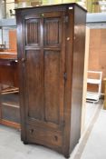 A traditional Priory style single wardrobe or hall robe, width approx. 73cm