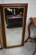 A mahogany framed wall mirror